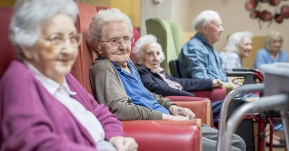nursing home sitting room with patients